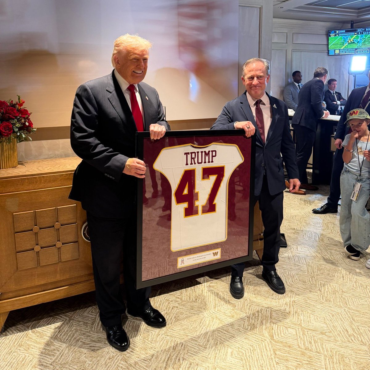 Josh Harris Gifts President Trump a Washington Commanders Jersey